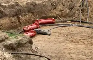 Installatie kabbelmoffen in zand